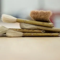 stacked paint Brushes